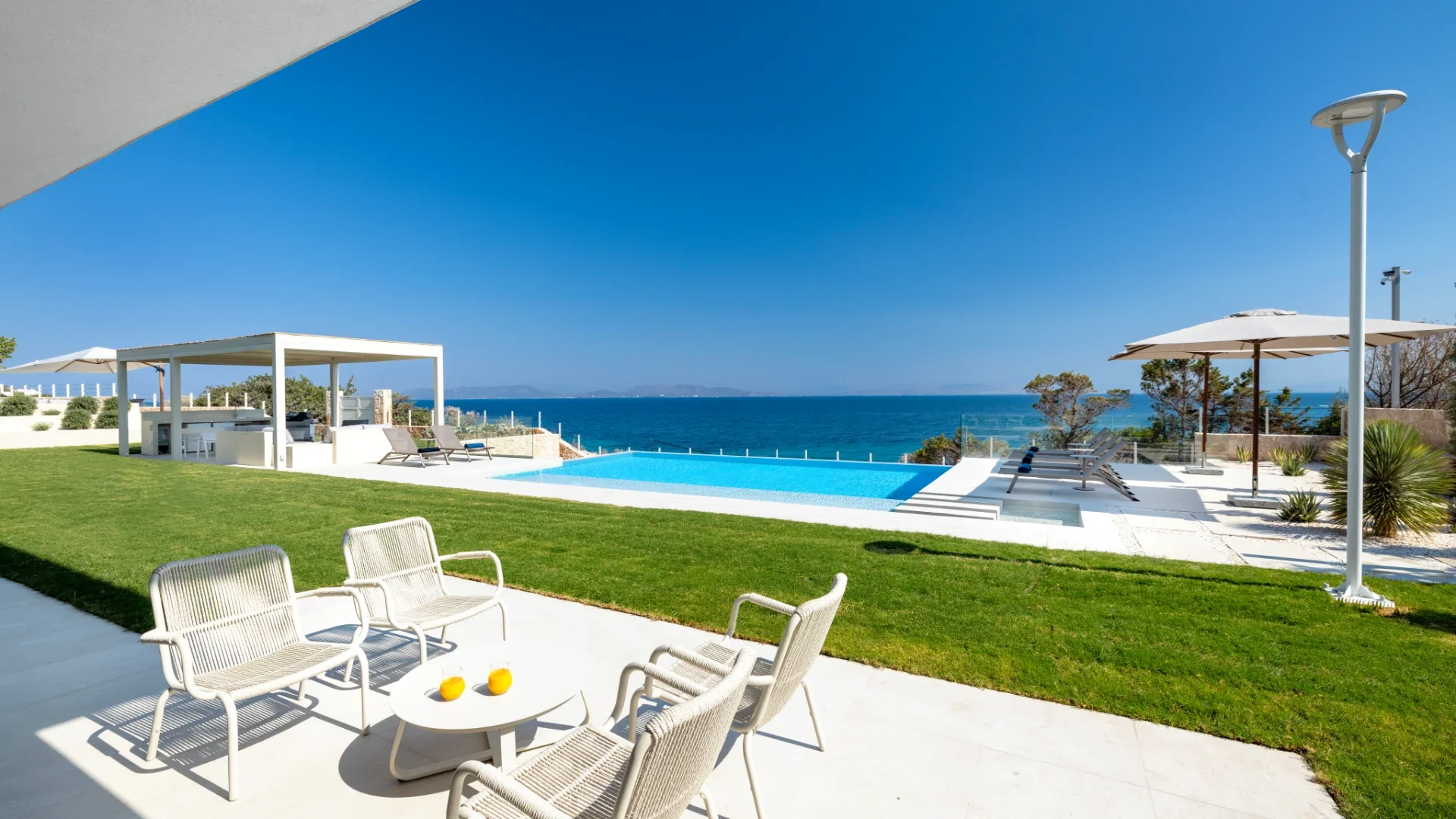 Pool terrace overlooking the Saronic Gulf